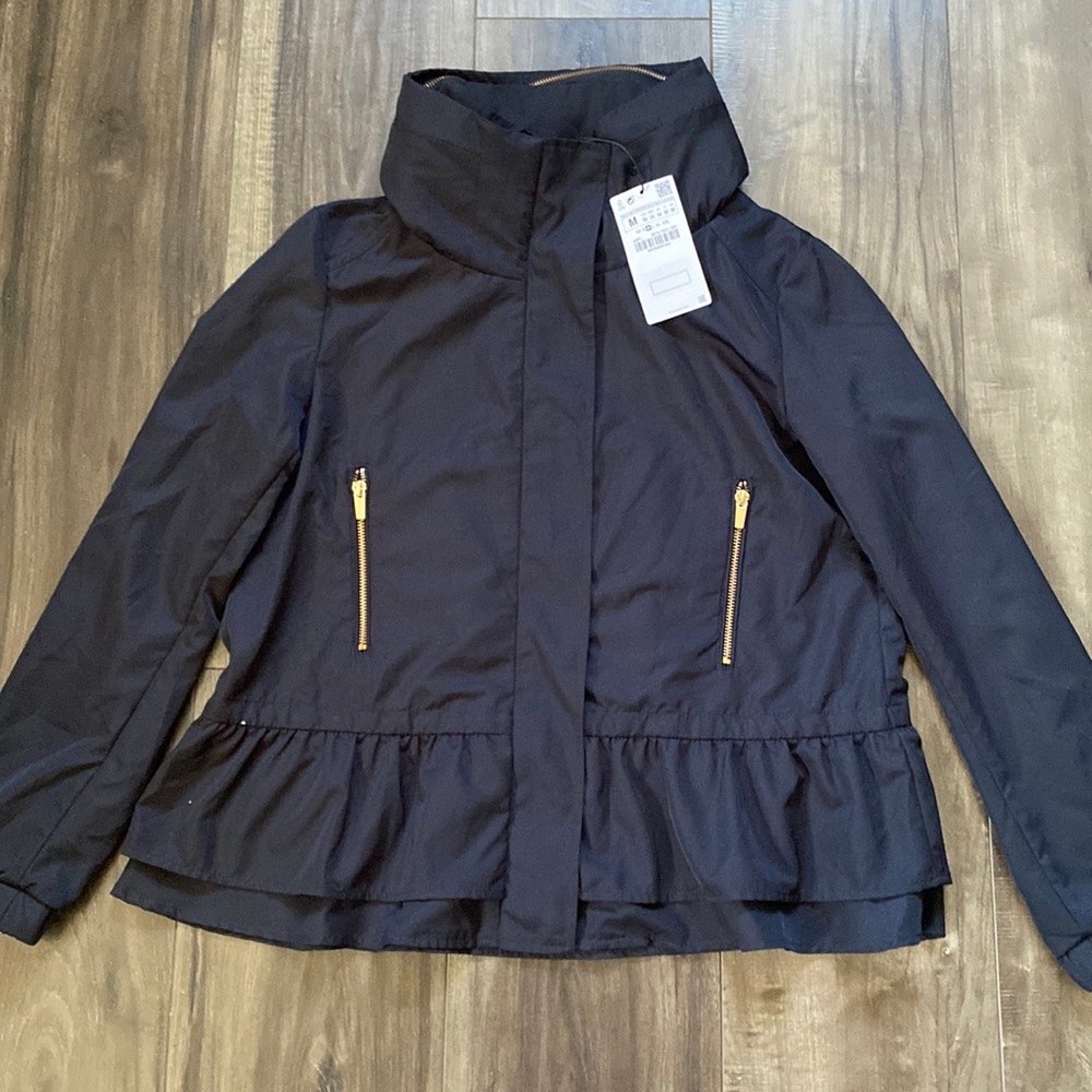 Zara jacket with zipper/snap closure and ruffle hem